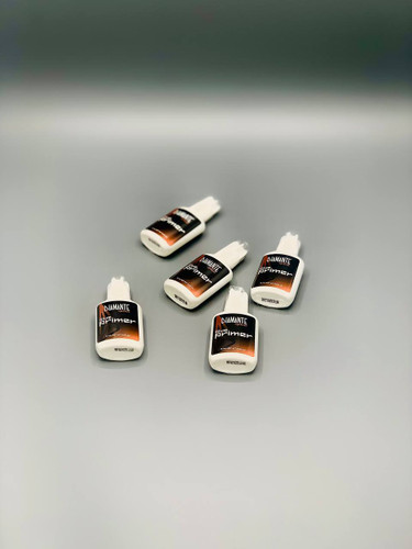 قطره پرایمر دیامانته روی براش مخصوص مژه